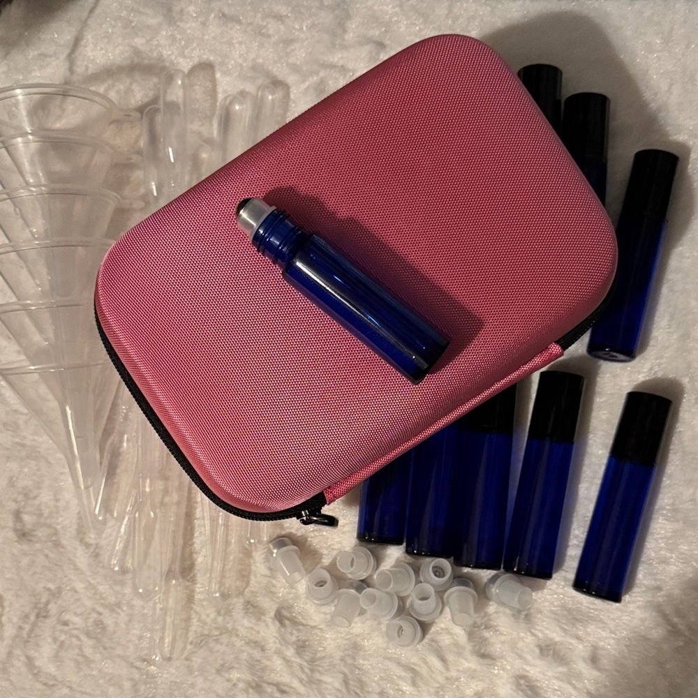 Pink and Black Travel Case with 12 Blue Roll On Bottles with Funnels Pipettes